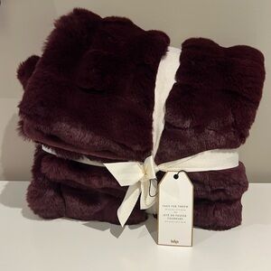 Gorgeous faux fur throw from indigo. Tag on brand new.